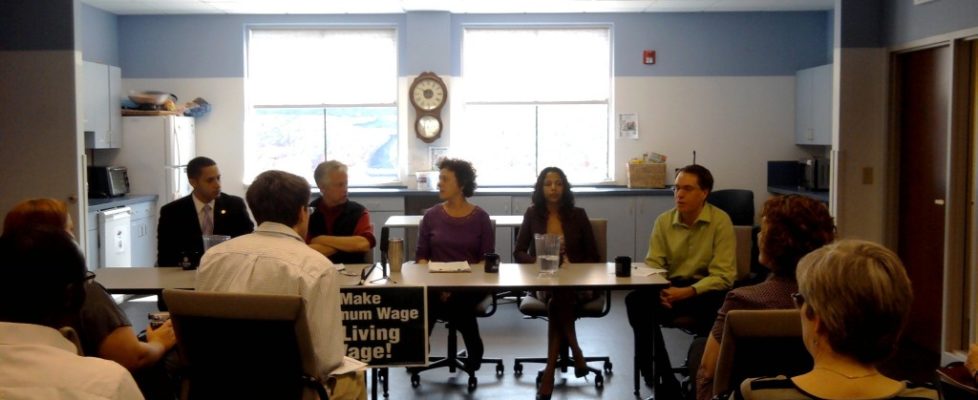 Over 30 people attended todays Press Conference at Alternatives Federal Credit Union where Alternatives updated the Living Wage for Tompkins County. Seated from left to right on the panel is: Svante Myrick, Ithacas Mayor; Pete Meyers, Coordinator of the Workers Center; Leni Hochman, Chief Operations Officer of Alternatives; Tierra Labrada, Alternatives Collections Assistant; and Tristram Coffin, Alternatives Chief Executive Officer. (Photo: Gina Lord) 