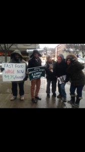 The TCWC Minimum Wage as Living Wage Organizing Committee in front of Starbucks in Ithaca.