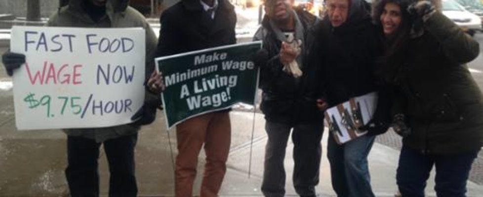 The TCWC Minimum Wage as Living Wage Organizing Committee in front of Starbucks in Ithaca.